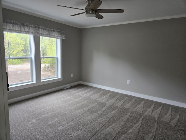 209 Sandy Acres Dr, Sullivan, ME 04664 - empty room with carpet, baseboards, crown molding, and a ceiling fan