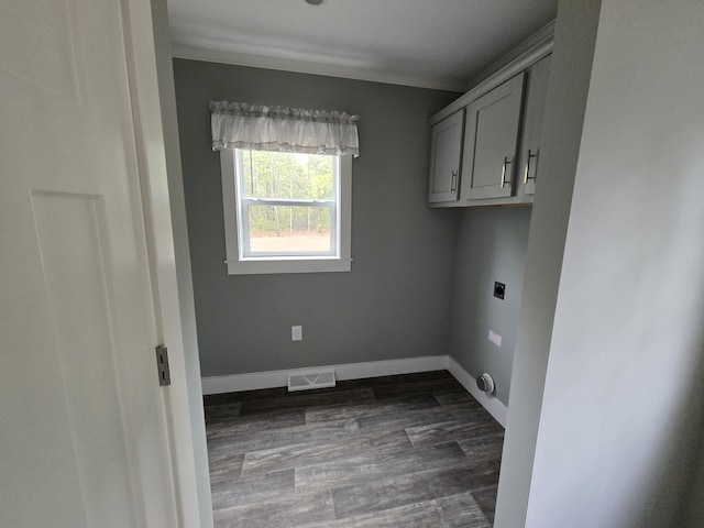 209 Sandy Acres Dr, Sullivan, ME 04664 - laundry area with hookup for an electric dryer, baseboards, dark wood-style flooring, and cabinet space