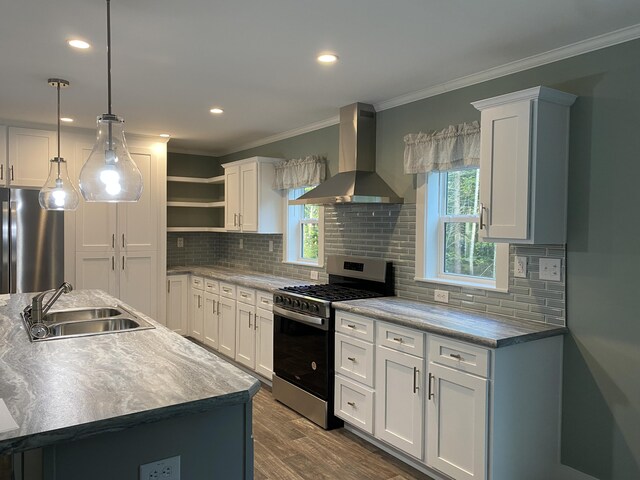 209 Sandy Acres Dr, Sullivan, ME 04664 - kitchen with stainless steel appliances, wall chimney exhaust hood, open shelves, ornamental molding, and white cabinets
