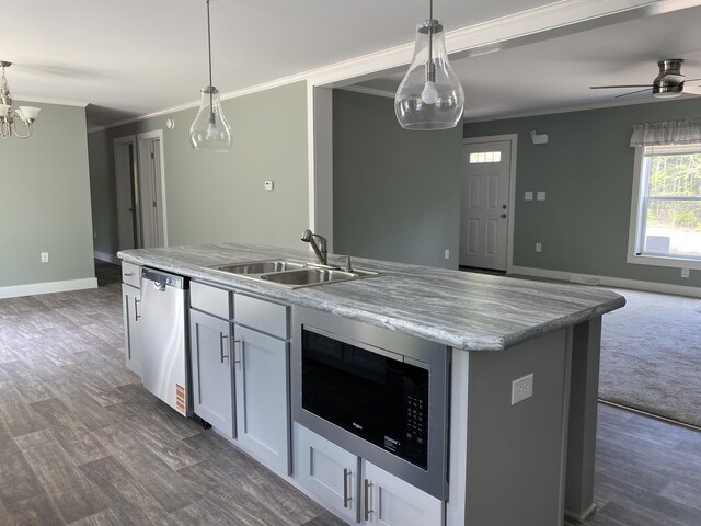 209 Sandy Acres Dr, Sullivan, ME 04664 - kitchen featuring dishwasher, built in microwave, ornamental molding, open floor plan, and hanging light fixtures