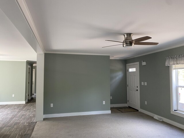 209 Sandy Acres Dr, Sullivan, ME 04664 - empty room featuring a ceiling fan, ornamental molding, and carpet flooring