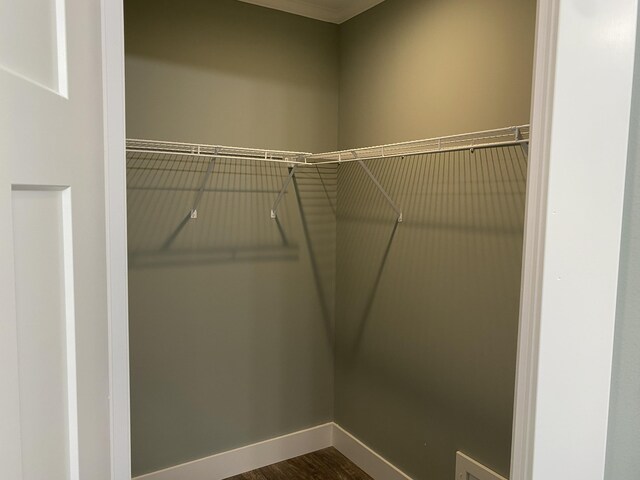 209 Sandy Acres Dr, Sullivan, ME 04664 - spacious closet featuring dark wood finished floors