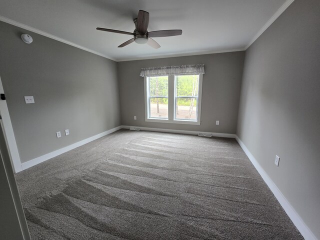 209 Sandy Acres Dr, Sullivan, ME 04664 - carpeted spare room featuring crown molding, a ceiling fan, and a smoke detector