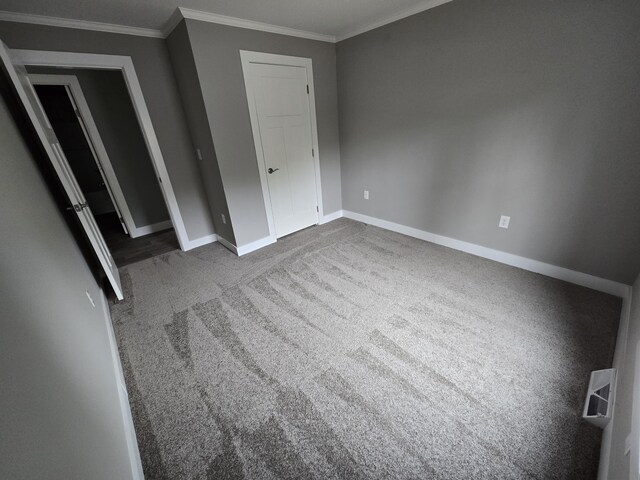 209 Sandy Acres Dr, Sullivan, ME 04664 - unfurnished bedroom with ornamental molding and carpet floors