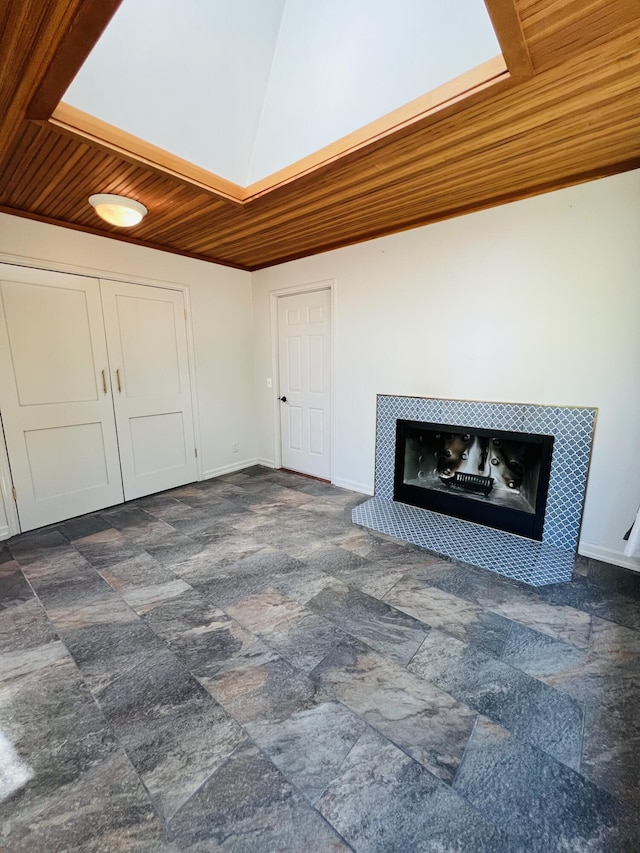 341 Ellsworth Rd, Blue Hill, ME 04614 - detailed view of a tile fireplace and baseboards