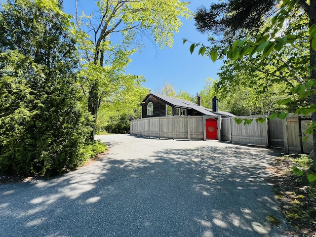341 Ellsworth Rd, Blue Hill, ME 04614 - view of side of home featuring a gate