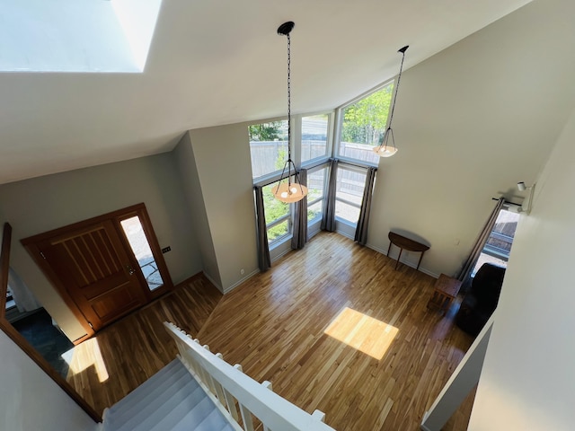 341 Ellsworth Rd, Blue Hill, ME 04614 - foyer featuring wood finished floors, high vaulted ceiling, and baseboards