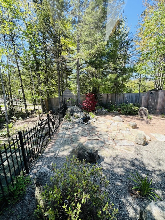 341 Ellsworth Rd, Blue Hill, ME 04614 - fenced backyard featuring a patio