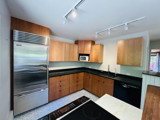 341 Ellsworth Rd, Blue Hill, ME 04614 - kitchen featuring built in refrigerator, a sink, dishwasher, and track lighting