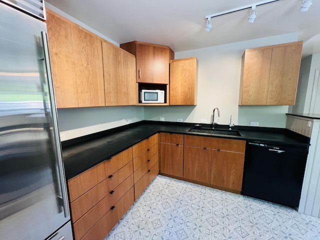 341 Ellsworth Rd, Blue Hill, ME 04614 - kitchen featuring stainless steel refrigerator, dishwasher, a sink, white microwave, and track lighting