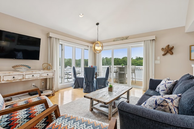 47 Ocean Ave Unit 6, Kennebunkport, ME 04046 - living area featuring healthy amount of natural light, wood finished floors, lofted ceiling, and recessed lighting