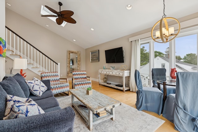 47 Ocean Ave Unit 6, Kennebunkport, ME 04046 - living room with a chandelier, lofted ceiling, light wood finished floors, ceiling fan, and recessed lighting