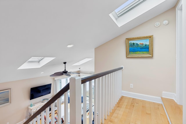 47 Ocean Ave Unit 6, Kennebunkport, ME 04046 - hallway with a skylight, lofted ceiling, light wood-style flooring, and recessed lighting
