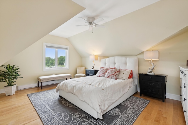 47 Ocean Ave Unit 6, Kennebunkport, ME 04046 - bedroom with wood finished floors, vaulted ceiling, ceiling fan, and a baseboard heating unit