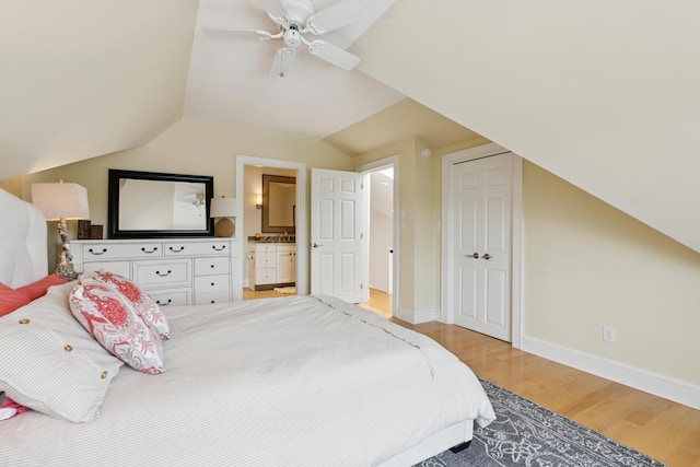 47 Ocean Ave Unit 6, Kennebunkport, ME 04046 - bedroom featuring light wood-type flooring, vaulted ceiling, ceiling fan, a closet, and ensuite bath