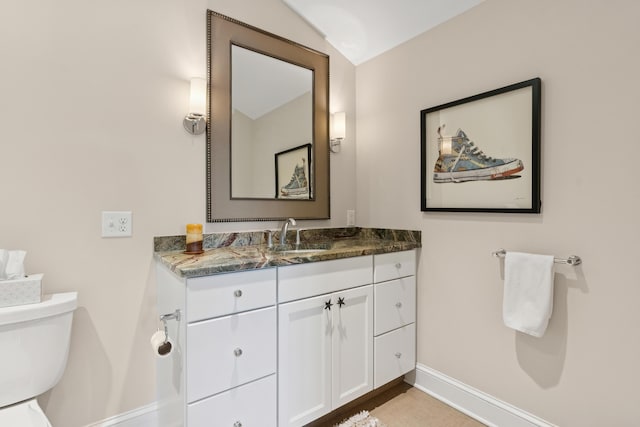 47 Ocean Ave Unit 6, Kennebunkport, ME 04046 - half bath featuring baseboards and vanity