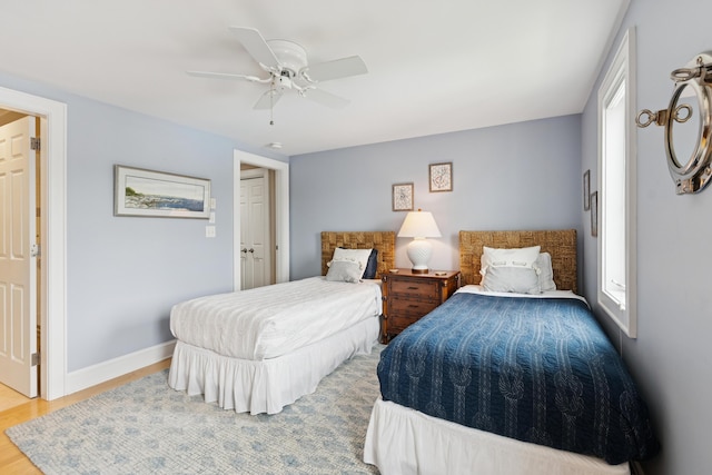 47 Ocean Ave Unit 6, Kennebunkport, ME 04046 - bedroom featuring a ceiling fan and wood finished floors