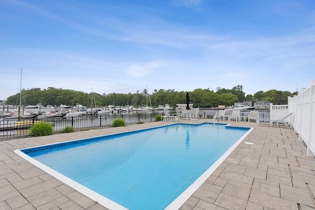 47 Ocean Ave Unit 6, Kennebunkport, ME 04046 - view of swimming pool with a patio and a water view