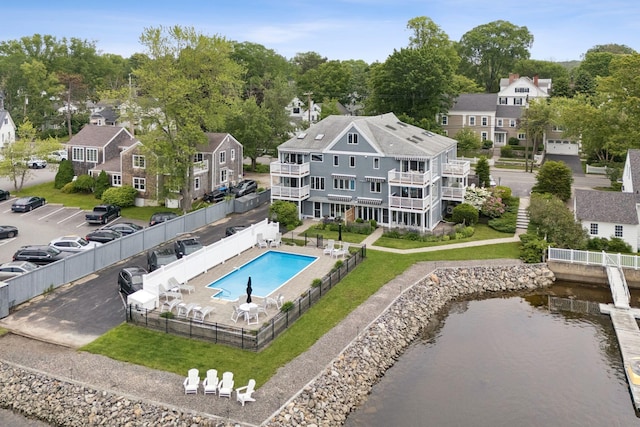 47 Ocean Ave Unit 6, Kennebunkport, ME 04046 - back of property featuring a fenced backyard, a patio area, and uncovered parking