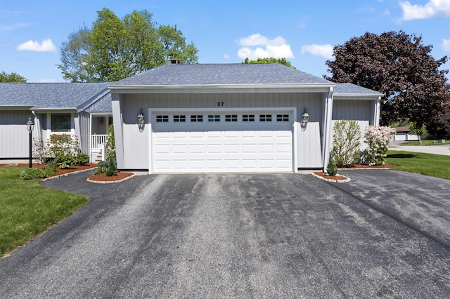 37 Longbow Ct, Auburn, ME 04210 - ranch-style home with a garage, driveway, and roof with shingles