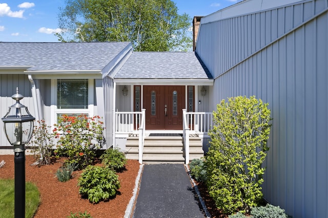37 Longbow Ct, Auburn, ME 04210 - view of exterior entry featuring roof with shingles and covered porch