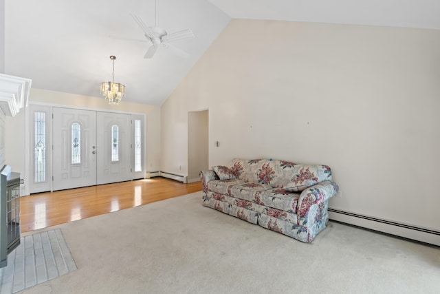 37 Longbow Ct, Auburn, ME 04210 - entryway featuring a baseboard heating unit, carpet floors, a chandelier, high vaulted ceiling, and a ceiling fan