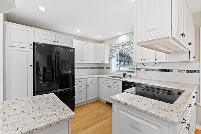 37 Longbow Ct, Auburn, ME 04210 - kitchen with black appliances, a sink, white cabinets, and recessed lighting