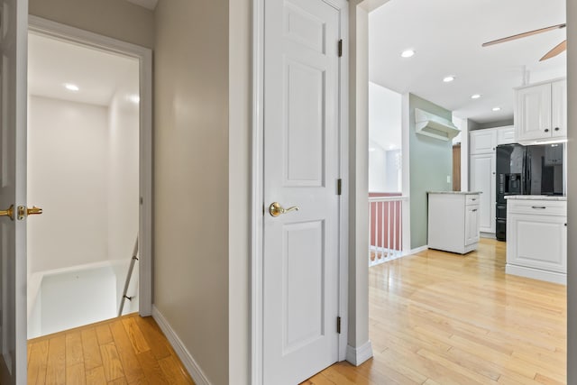 37 Longbow Ct, Auburn, ME 04210 - hall featuring baseboards, light wood-style floors, recessed lighting, and an upstairs landing