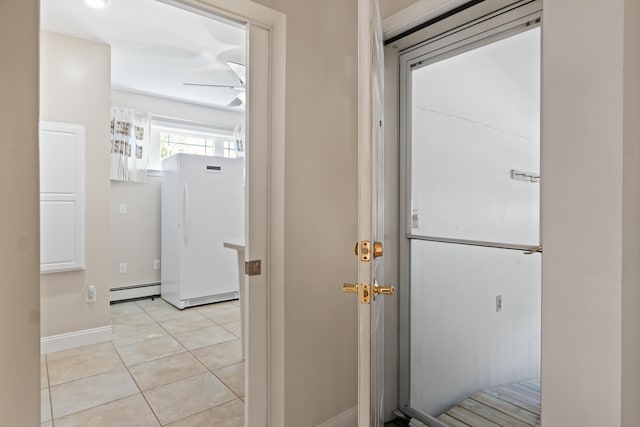 37 Longbow Ct, Auburn, ME 04210 - hall with baseboards, light tile patterned floors, and a baseboard radiator