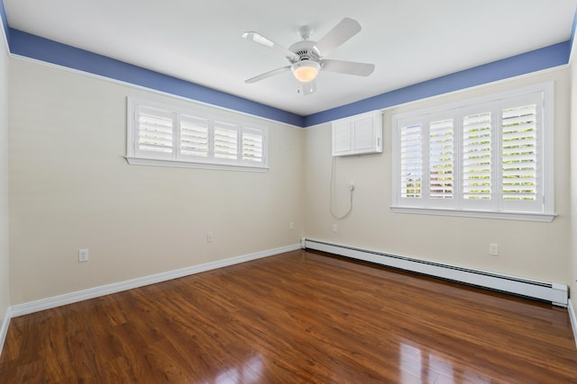 37 Longbow Ct, Auburn, ME 04210 - spare room featuring a baseboard heating unit, wood finished floors, baseboards, and a ceiling fan
