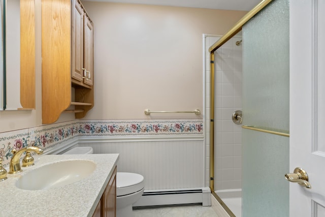 37 Longbow Ct, Auburn, ME 04210 - bathroom featuring a baseboard heating unit, a stall shower, a wainscoted wall, toilet, and vanity