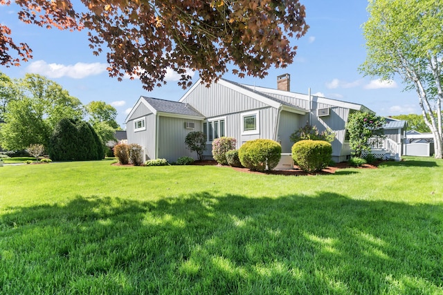 37 Longbow Ct, Auburn, ME 04210 - view of side of property featuring a chimney and a lawn