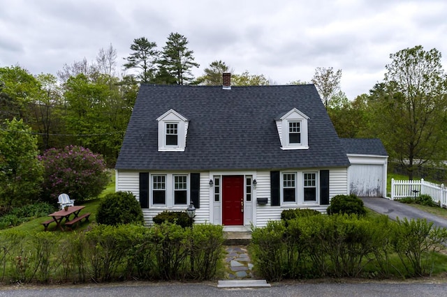 57 Bow St, Freeport, ME 04032 - cape cod house featuring a chimney and roof with shingles