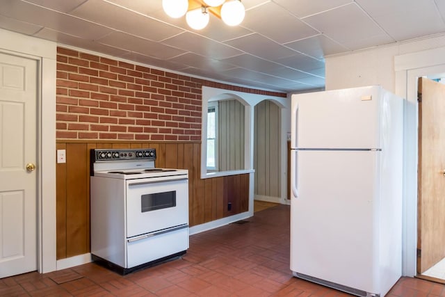 57 Bow St, Freeport, ME 04032 - kitchen featuring white appliances and brick patterned floors