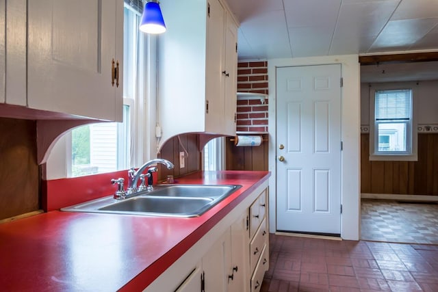 57 Bow St, Freeport, ME 04032 - kitchen featuring a sink and white cabinetry