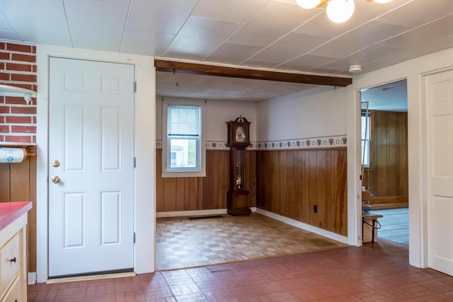 57 Bow St, Freeport, ME 04032 - entryway featuring a wainscoted wall and wooden walls