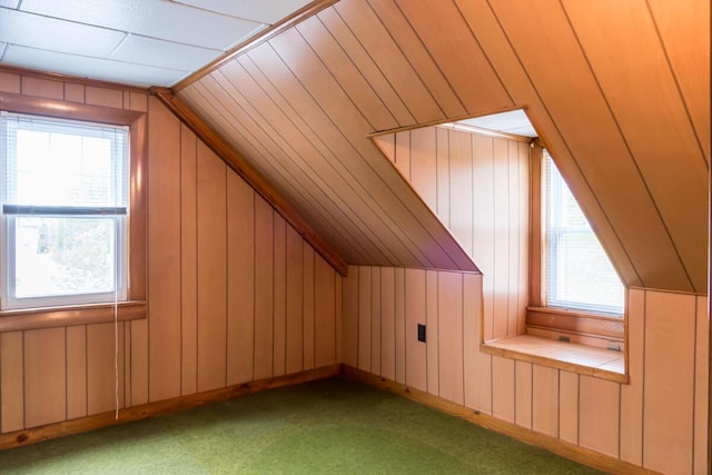 57 Bow St, Freeport, ME 04032 - bonus room featuring lofted ceiling, carpet floors, and wooden walls
