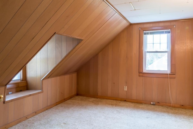 57 Bow St, Freeport, ME 04032 - bonus room featuring vaulted ceiling, wooden walls, and carpet flooring