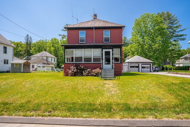 27 Maple St, Limerick, ME 04048 - american foursquare style home with a garage, an outdoor structure, a front yard, and entry steps