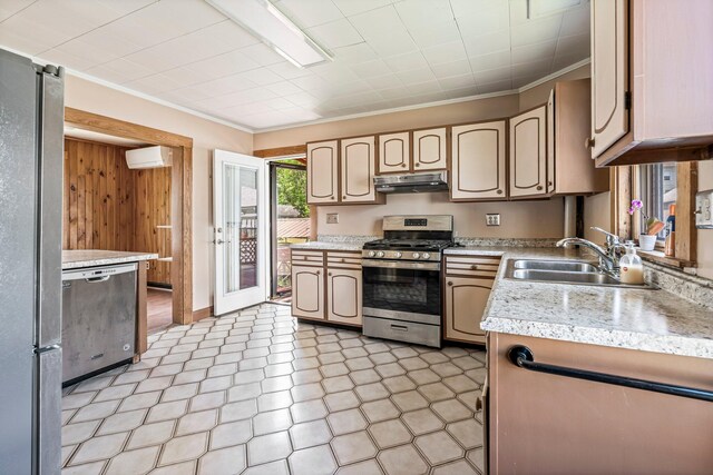 27 Maple St, Limerick, ME 04048 - kitchen with appliances with stainless steel finishes, a sink, under cabinet range hood, crown molding, and light countertops