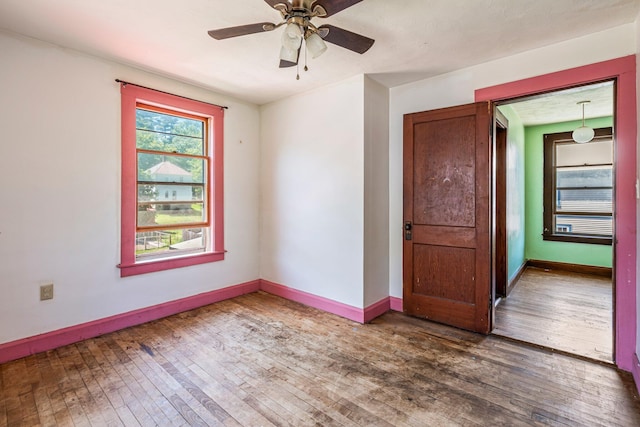 27 Maple St, Limerick, ME 04048 - empty room with hardwood / wood-style flooring and baseboards