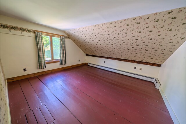 176 Bagley Hill Rd, Troy, ME 04987 - bonus room with hardwood / wood-style floors, a baseboard heating unit, vaulted ceiling, and baseboards