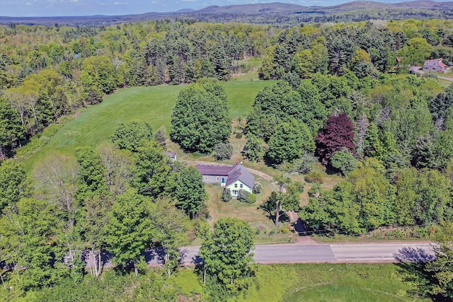 176 Bagley Hill Rd, Troy, ME 04987 - aerial view of property's location with a forest and a mountainous background