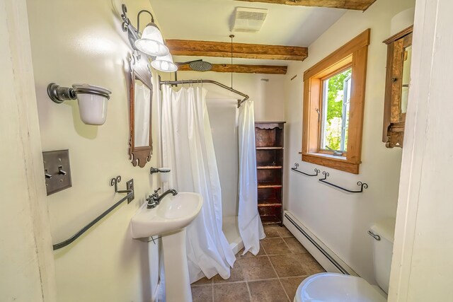 176 Bagley Hill Rd, Troy, ME 04987 - full bath with a baseboard radiator, beam ceiling, toilet, a shower with curtain, and tile patterned floors