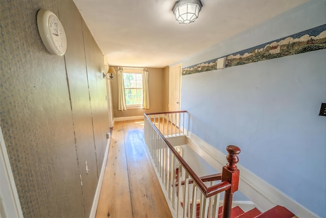 176 Bagley Hill Rd, Troy, ME 04987 - hall featuring an upstairs landing, light wood finished floors, and baseboards