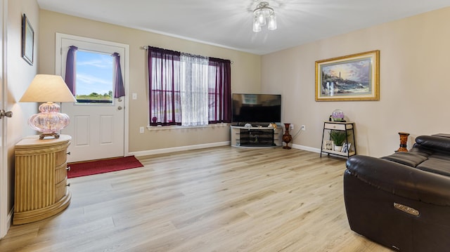 51 Stearns Farm Rd, Hampden, ME 04444 - living room featuring light wood finished floors and baseboards