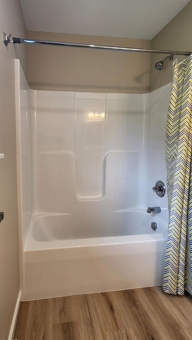 51 Stearns Farm Rd, Hampden, ME 04444 - full bath with wood finished floors and shower / bath combo