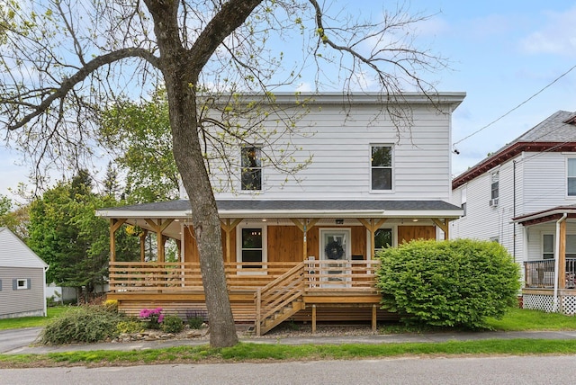 124 Dumont Ave, Lewiston, ME 04240 - view of front of property featuring covered porch and board and batten siding