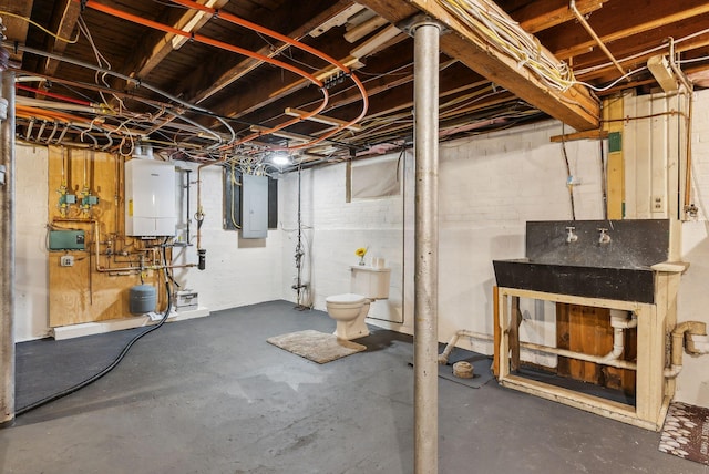 124 Dumont Ave, Lewiston, ME 04240 - unfinished basement with electric panel and tankless water heater