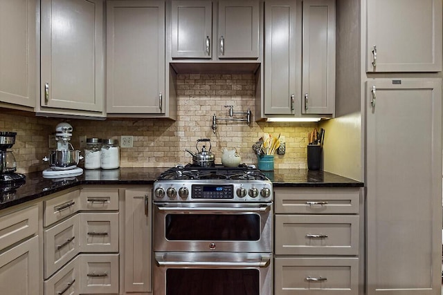 39 Lobo Ln, West Gardiner, ME 04345 - kitchen featuring gas stove, backsplash, and dark stone counters